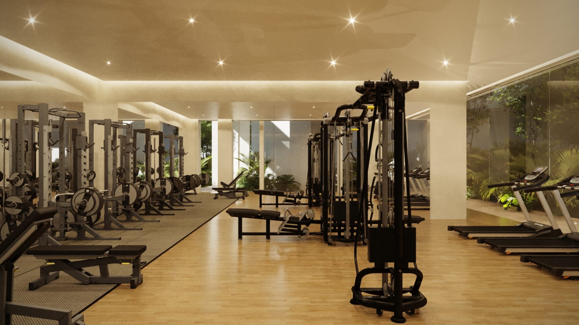 Gimnasio totalmente equipado en Macondo Tulum con áreas de pesas, máquinas de cardio y vista al jardín tropical, parte de los departamentos en venta en Tulum diseñados para un estilo de vida activo y saludable.